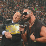 Seth-Rollins-lanza-su-Maletin-personalizado-de-Money-in-the-Bank-junto-a-Paul-Heyman-en-WWE-Raw-30-d.jpeg