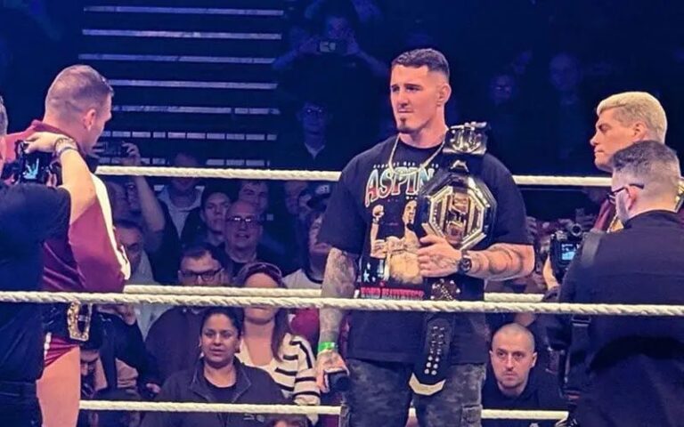 interim-ufc-heavyweight-champion-tom-aspinall-shares-ring-with-cody-rhodes-and-gunther-at-wwe-live-e.jpeg