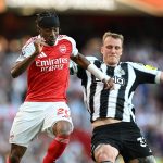 london-england-noni-madueke-of-arsenal-is-challenged-by-dan-burn-of-newcastle-united-during_z5mtp242.jpeg
